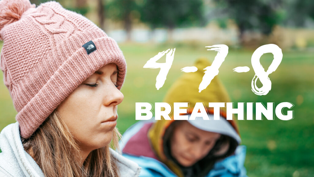 a woman practicing 4-7-8 breathing technique