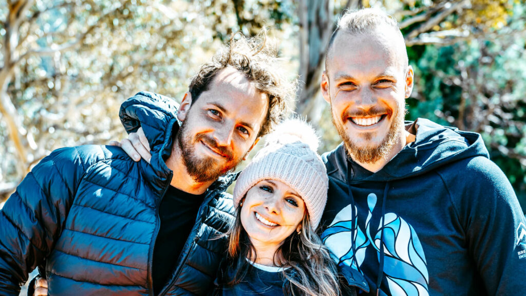 Breathwork Facilitators smiling at the camera.